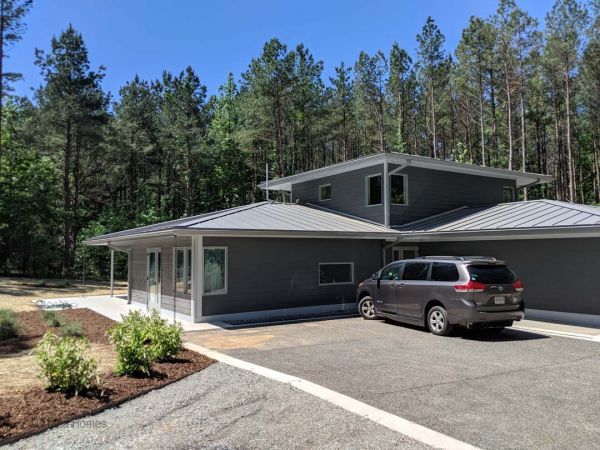 Backyard perspective of modern home exterior