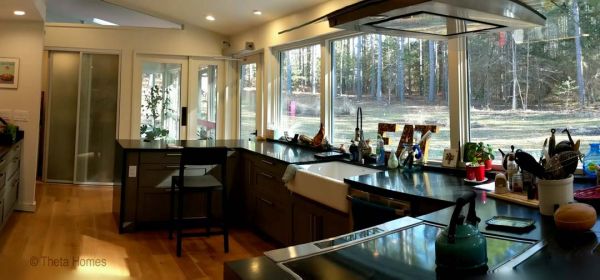 Long shot of home silhouette against sky