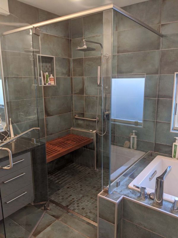 Backyard view focusing on garden and house interface