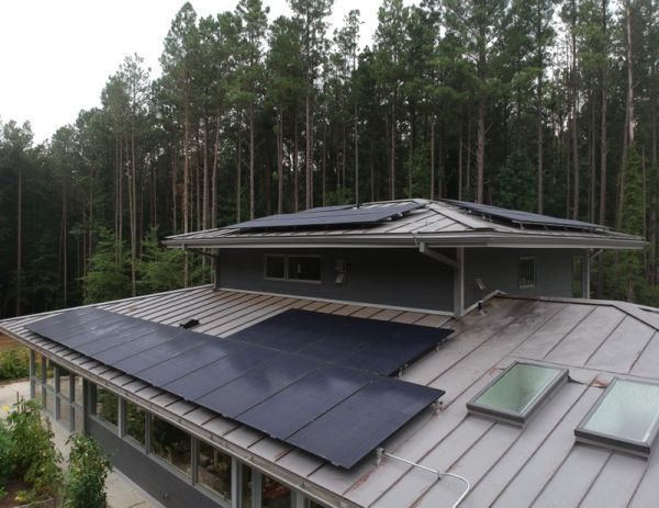 Modern custom home with garden seating area