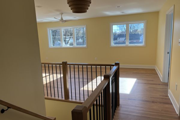 Open kitchen with breakfast bar and modern cabinetry